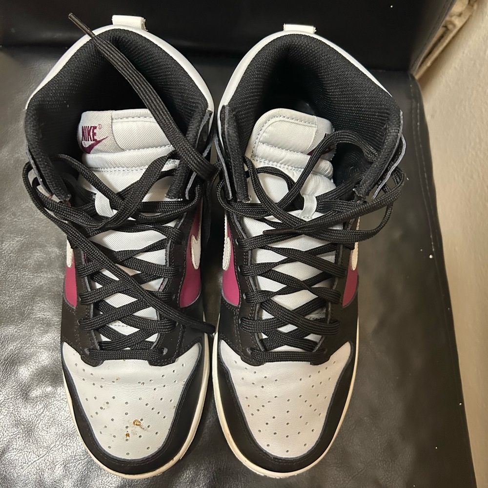White black and purple Nike shoes